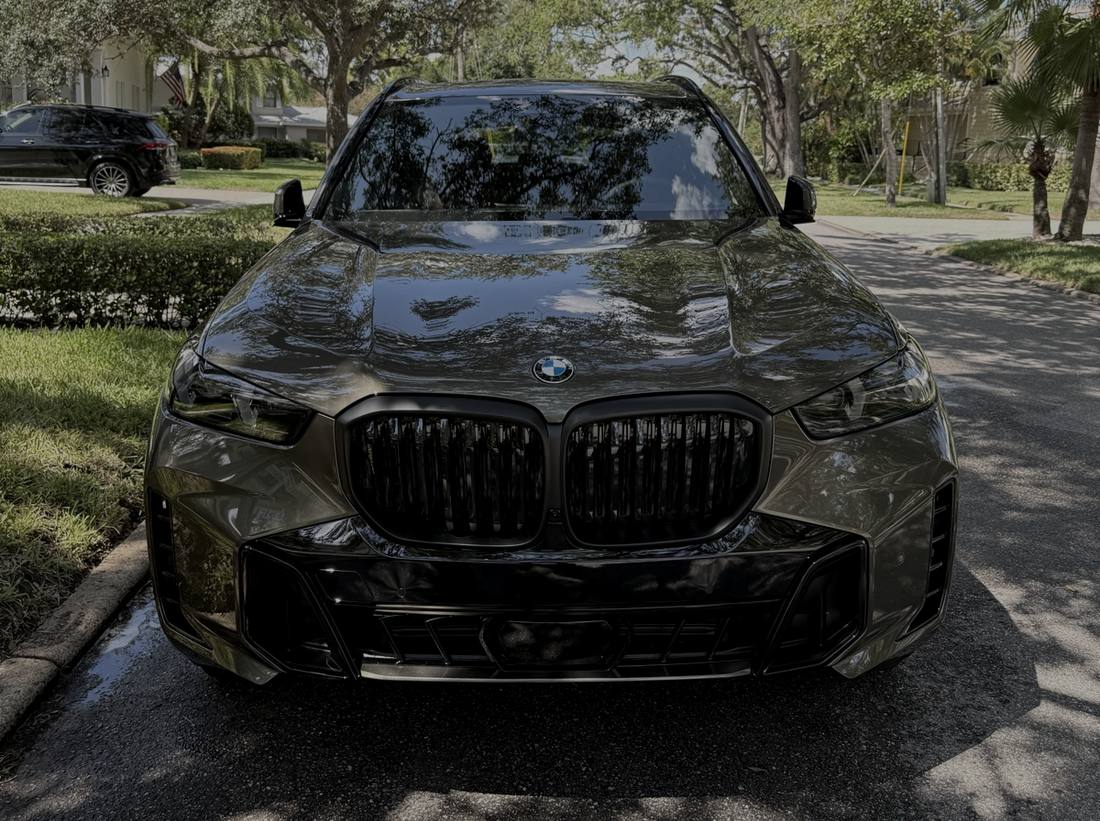 Freshly detailed vehicle front end with deep gloss